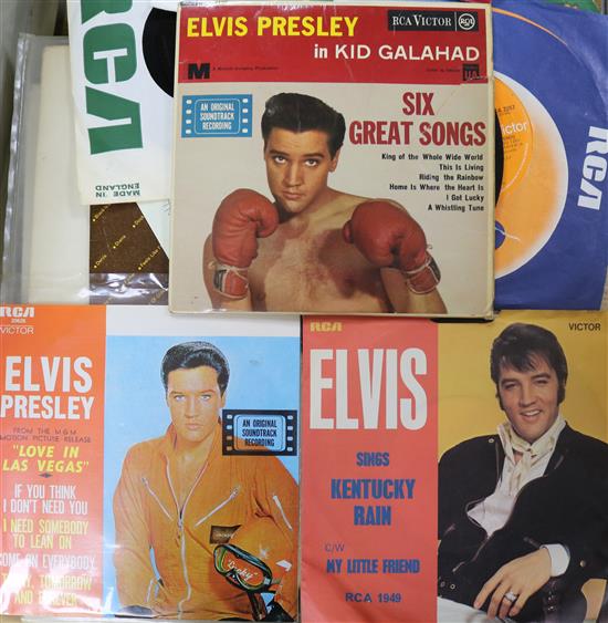 A collection of 43 Elvis Presley singles and EPs